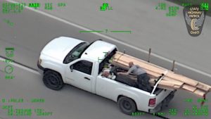 Man Throws Wood From Bed of Pickup Truck During Police Chase in Ohio