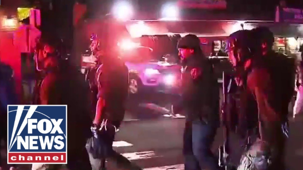 Person of interest in custody after deadly Brown University shooting