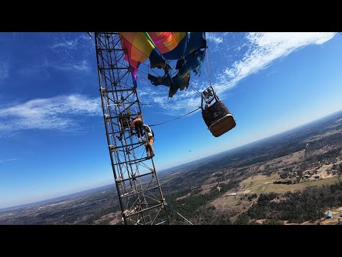 Drone video shows rescue after hot air balloon hits radio tower