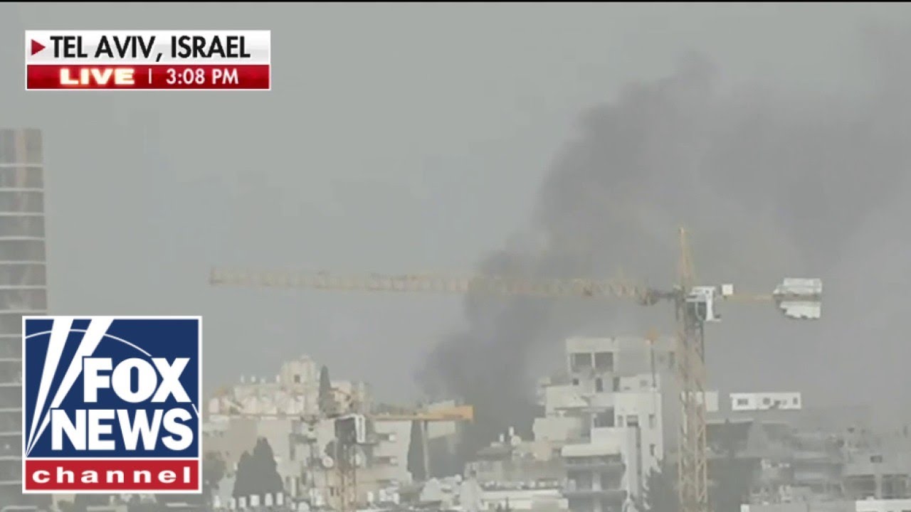 Smoke rises over Israel as Iran launches attacks