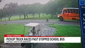 New video School bus lights flashing well before driver whizzed by, nearly hitting girl