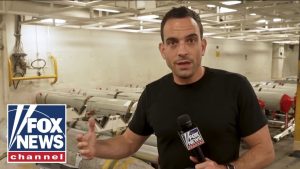 Trey Yingst showcases bunker buster bombs aboard US carrier